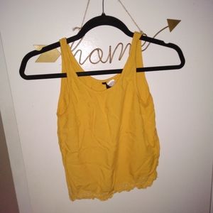 Divided H&M gold tank